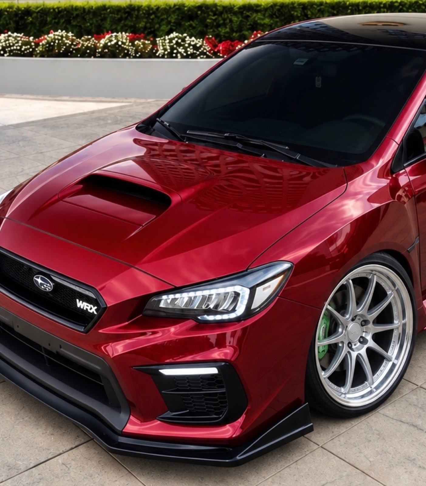 Red performance vehicle with a premium exterior wrap